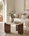 Generated with Kive.ai - Luxury interior photography of a handcrafted solid natural mango wood coffee table as the central focal point of a Mediterranean-inspired living room. The space is designed with contemp (2).webp