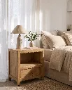Generated with Kive.ai - Luxury interior photography of a handcrafted solid wood bedside table as the main focal point of a sophisticated Mediterranean-inspired bedroom. The composition is carefully designed so (5).webp