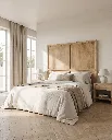 Generated with Kive.ai - Wooden table top Ultra-photorealistic luxury bedroom interior featuring a modern headboard as the absolute focal point. The headboard is perfectly centered behind a neatly made bed with (1).webp
