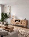 Generated with Kive.ai - Edit Image 1 only. Keep the entire living room exactly unchanged same wall_ artwork_ curtains_ plants_ sofa_ rug_ TV-free wall_ TV sideboard_ ceramics_ lighting_ shadows_ camera angle_ pers.webp